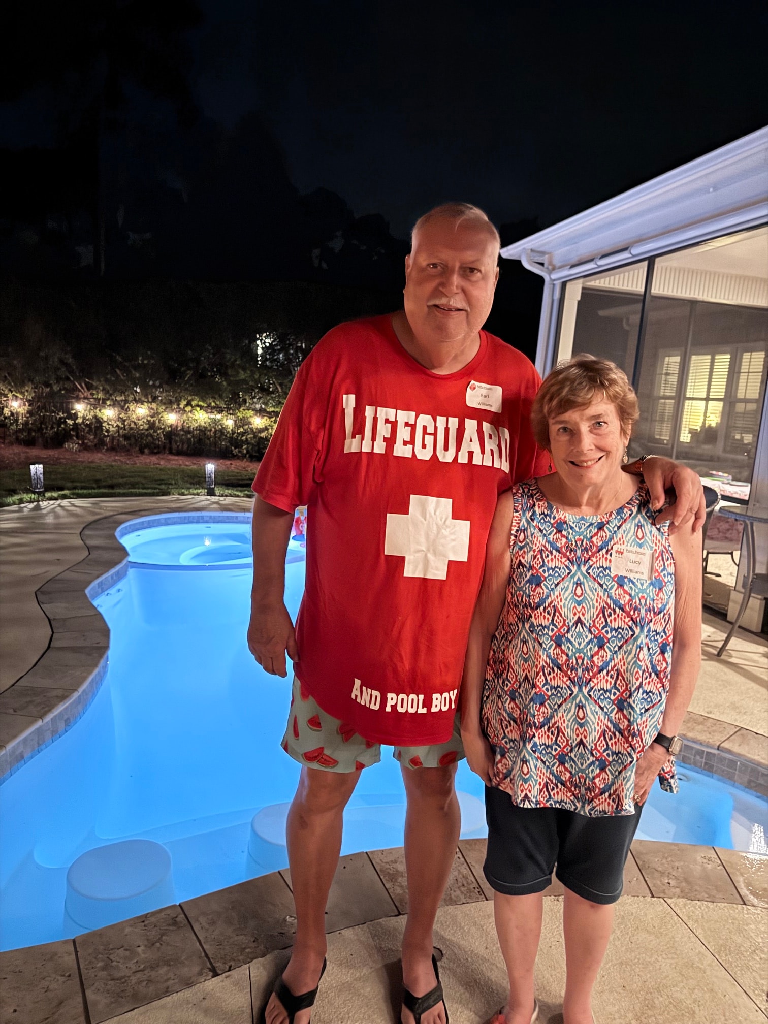 Captain Earl Williams and Lucy Williams by the pool at the end of the evening