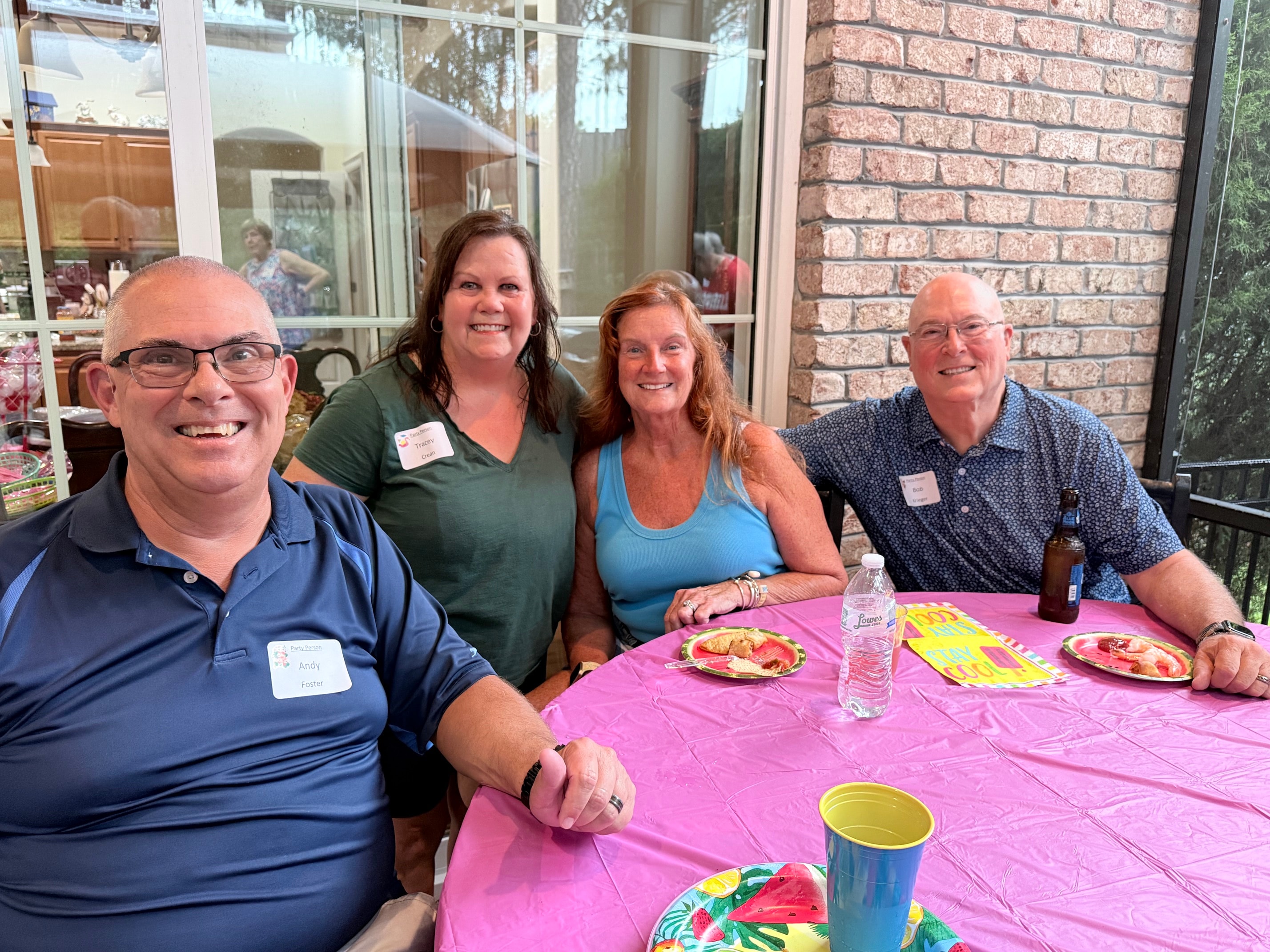 Andy Foster and guests seated at an outdoor table at the Fire Police appreciation dinner
