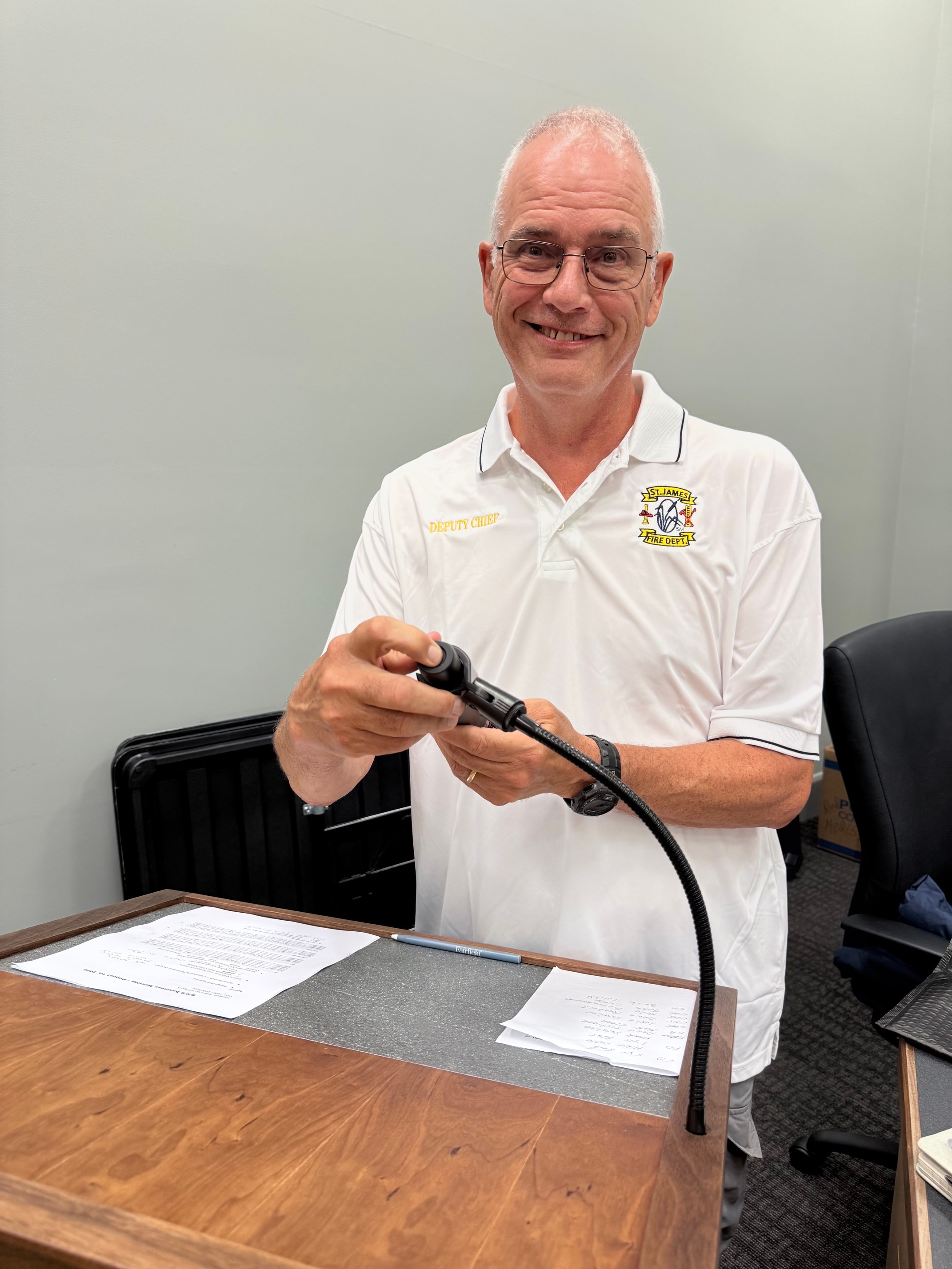 Deputy Chief Chet Swirski presenting service awards at the August 10 meeting