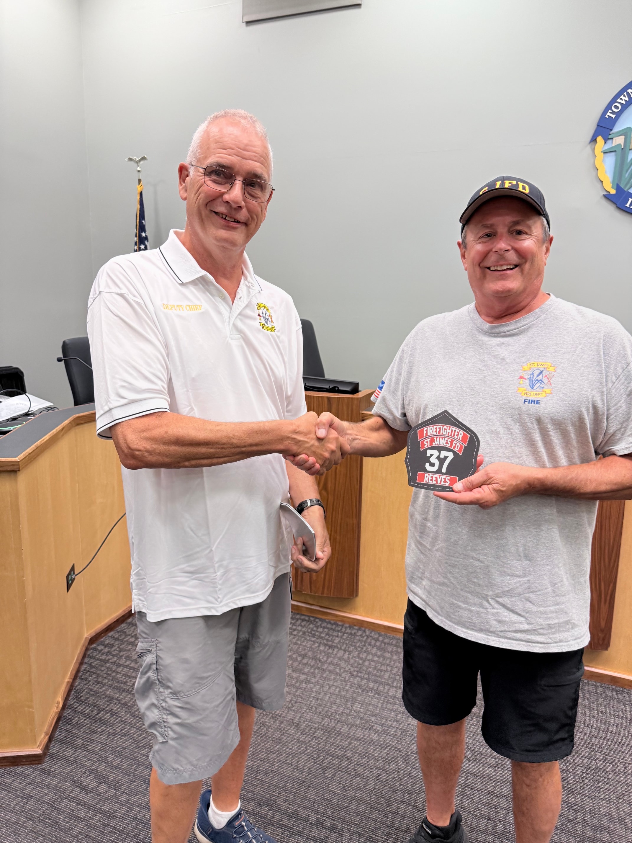 Dave Reeves receiving his 5-year service award and personalized helmet shield